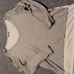 Vince V Neck Long Sleeve Shirt. Has a layered look.